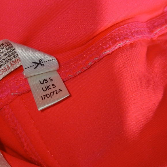 FP Movement High Rise Infinity Yoga Leggings in Vivid Coral - Picture 10 of 11